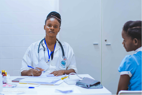 female nurse sitting in office