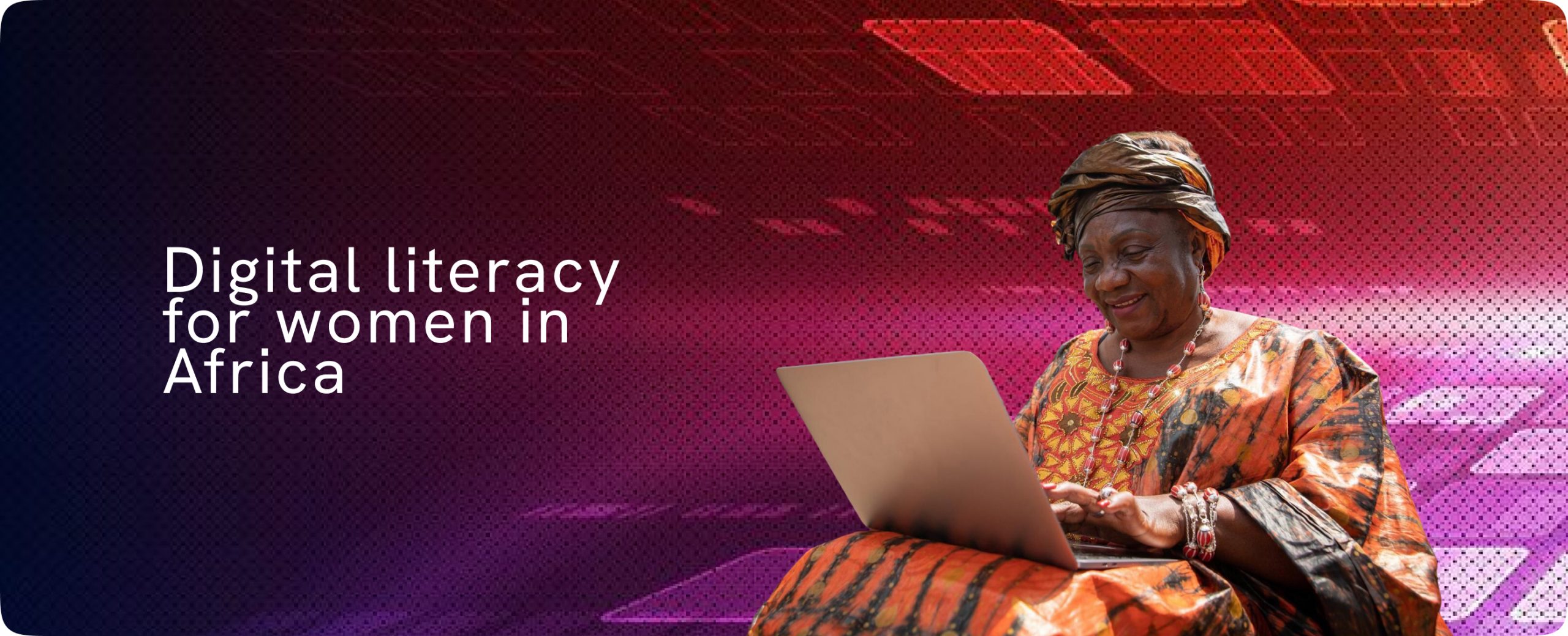 An elderly African woman smiling while operating a laptop to demonstrate digital literacy for women in Africa.