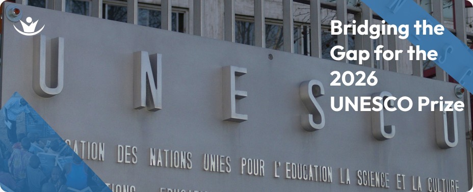 A large outdoor billboard featuring the UNESCO logo and name, symbolizing the global commitment to digital literacy for girls in Africa and the 2026 prize for education.