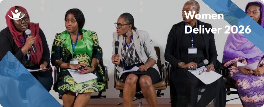 A group of local women leaders sitting together in a committee meeting to discuss gender equality and community advocacy during the Women Deliver 2026 conference.