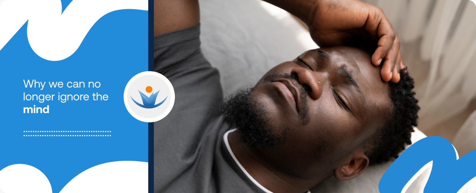 A man with his head down and eyes closed, resting his hand on his forehead in a moment of distress, representing the urgent need for community mental health Africa 2026.