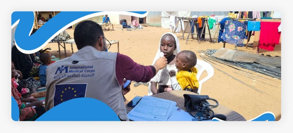 A medical professional administering oral vaccinations to children in a crisis-affected area, providing vital support for shattered communities in North Africa.
