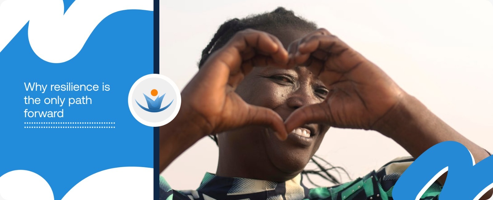 A local woman making a heart sign with her hands, symbolizing the emotional strength and resilience amidst crisis Africa 2026.