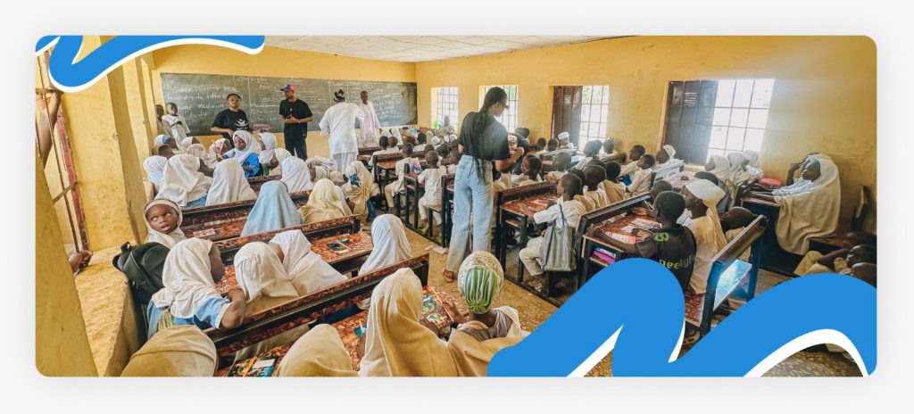 Students in class alongside their teacher and two Better Life NGO staffs, collaborating on solutions to fix the lack of enough teachers because there is no enough funds to pay the teachers.