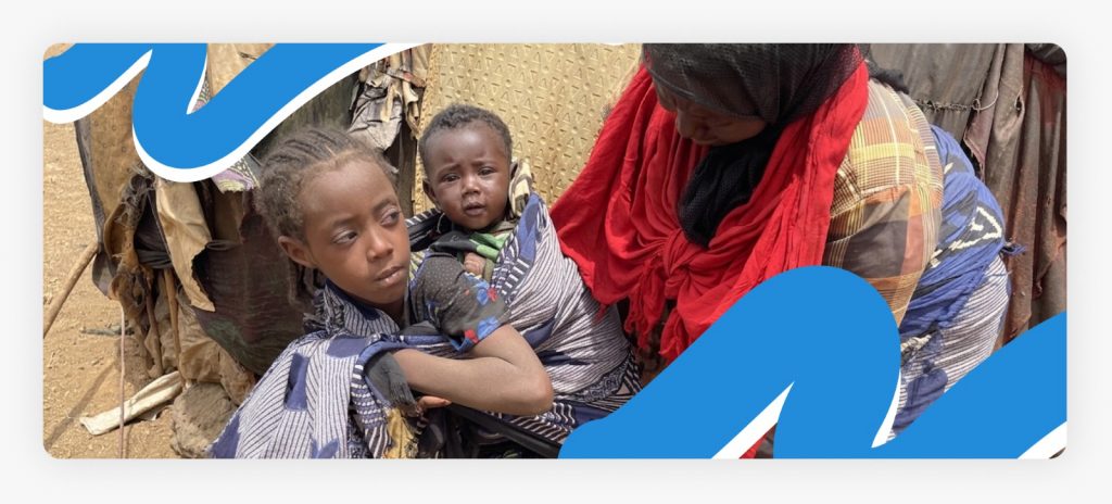 young-girl-carrying-baby-on-back-support-for-vulnerable-girls-in-africa.jpg
